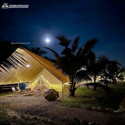 Star Fish Leisure Farm glamping bell tent at night under moonlight